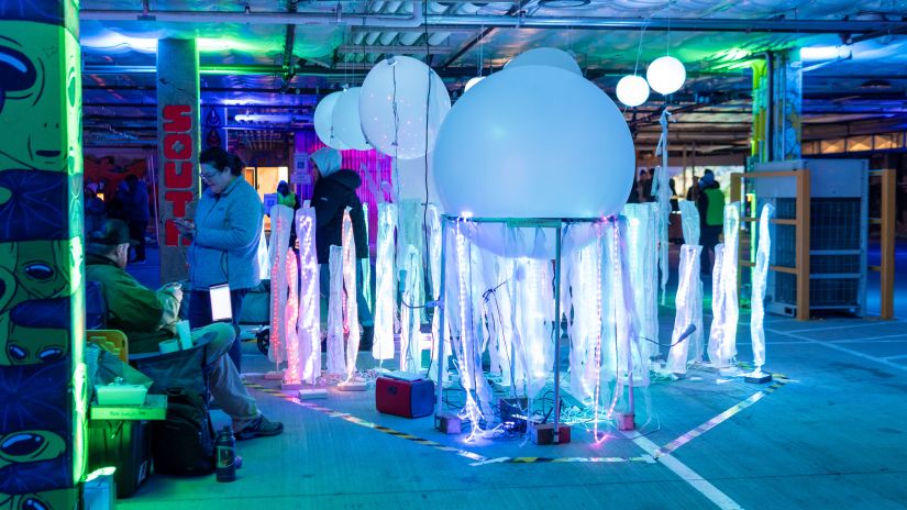 giant glowing orbs looking like jellyfish art installation