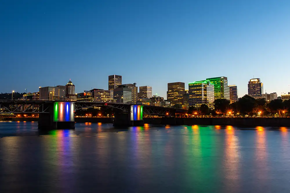City skyline twilight illuminated bridge