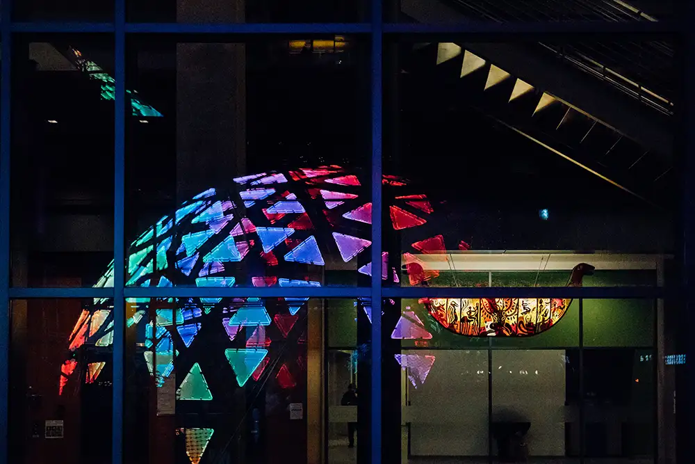 illuminated geodesic dome at night