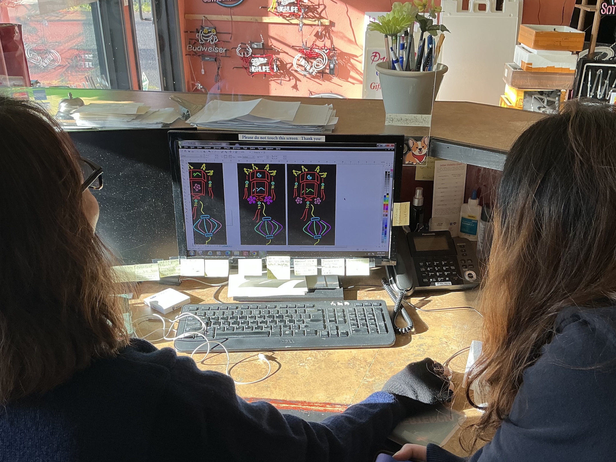 Jennah with Artico Lite neon sign shop and Mandy with @COREPDX finalizing colors for the neon piece