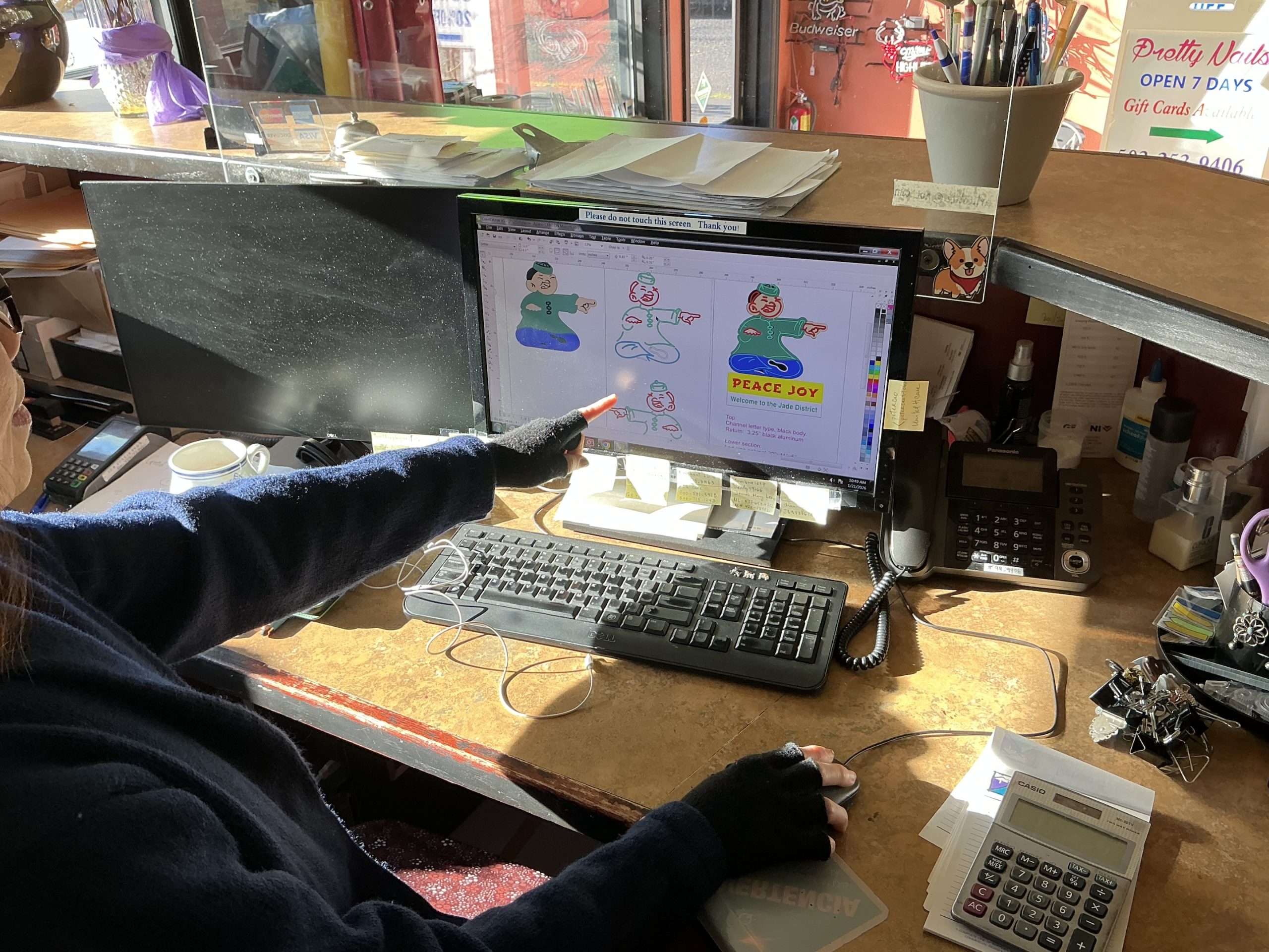 Working with Jennah with Artico Lite neon sign shop finalizing Canton Grill mascot neon design